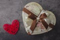 A gift in the shape of a heart for a holiday. Valentine`s day or wedding. Wedding.