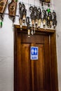 Wooden bathroom door in gift shop abstract portrait