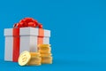 Gift with stack of coins Royalty Free Stock Photo