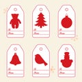 Gift tags with new year and christmas symbols with ribbon. Royalty Free Stock Photo