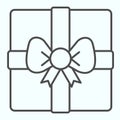 Gift thin line icon. Present box with ribbon bow. Christmas vector design concept, outline style pictogram on white