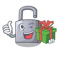 With gift unlocking padlock on the cartoon gate Royalty Free Stock Photo