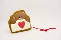 Gift for Valentine`s Day. Original gingerbread, a bear with a heart