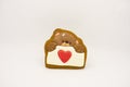 Gift for Valentine`s Day. Original gingerbread, a bear with a heart