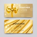 Gift voucher design template. Set of premium promotional card with realistic golden bow, ribbon and silk isolated on Royalty Free Stock Photo