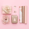 Gift wrapping. Pink and gold nordic christmas gifts isolated on pastel pink background. Royalty Free Stock Photo