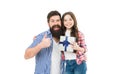 Gift your family with love. Bearded man show thumbs up. Little child hold gift box. Happy family. Celebrating birthday