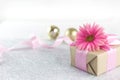 Giftbox and pink ribbon background Royalty Free Stock Photo