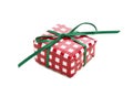 Giftbox wrapped in red and white checked paper