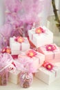 Gifts boxes for guests in rose color with ribbon