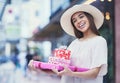 Gifts, boxes and portrait of a woman in a shopping mall buying products for a party, event or celebration. Happy, smile