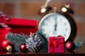 Gifts, candy, alarm clock and Christmas decorations Royalty Free Stock Photo