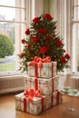 gifts and Christmas tree with decorations and flowers in living room, decorated for Christmas or New Year\'s holiday, gifts Royalty Free Stock Photo