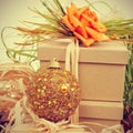 Gifts decorated with natual ornaments and christmas ball, with r Royalty Free Stock Photo