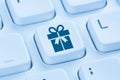 Gifts gift present online shopping ordering internet shop concept blue computer keyboard