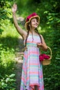 Gifts of nature. beautiful girl with flowers. little girl holding pink fresh blossoming flower bouquet of roses. flower