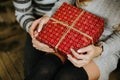 Gifts for the new year in the hands of a family holiday