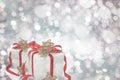 Gifts over Glow glitter background. Elegant abstract background with bokeh