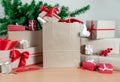 Gifts package box shopping bag white christmas tree red new year delivery Royalty Free Stock Photo