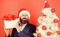 Gifts shop. Christmas gifts. Winter holidays. Boxing day. Christmas party. Man bearded hipster formal suit christmas Royalty Free Stock Photo