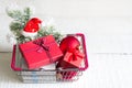 Gifts in shopping basket Royalty Free Stock Photo