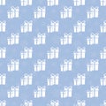 Gifts silhouette on a blue background. Seamless vector pattern.