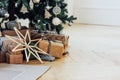 Gifts under decorated Christmas tree, minimalistic Scandinavian Royalty Free Stock Photo