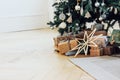 Gifts under decorated Christmas tree, minimalistic Scandinavian Royalty Free Stock Photo