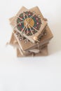Gifts wrapped in kraft paper. The packaging ornament mandala.