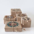 Gifts wrapped in kraft paper. The packaging ornament mandala.