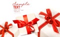 Gifts wrapped with red ribbons isolated on white Royalty Free Stock Photo