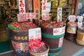 Shop sells Japanese sweets and food in colorful bamboo baskets atTakayama Old Town in Takayama, Gifu, Japan