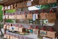 Traditional wooden prayer tablet Ema at Shirakawa Hachiman shrine in Shirakawago, Gifu, Japan. a