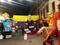 Gigantic Effigies Stand in the Street Waiting to be Burned on New Years Eve