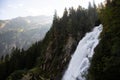 Gigantic masses of water at the `Krimmler Waterfalls` in the sunshine