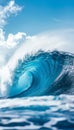 Gigantic ocean wave towering under clear blue sky background with side view perspective Royalty Free Stock Photo
