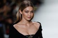 Gigi Hadid walks the runway at the Versace show during Milan Fashion Week Spring/Summer 2018