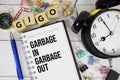 GIGO - Garbage In Garbage Out acronym on notepad, Business and Financial concept Royalty Free Stock Photo