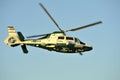 Gijon, Spain - July 23, 2022. Botton view of Guardia Civil Eurocopter AS365 Dauphin during Gijon International Air festival 2022