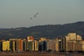 Gijon, Spain - July 23, 2022. Pioneer Team, Italian aerobatic team flying over San Lorenzo beach and city in Gijon International Royalty Free Stock Photo