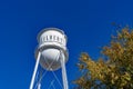 White Gilbert Water Tower with text