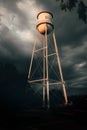 Gilbert water tower as a monsoon storm approcahes, gloomy mood, vertical