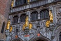 Gilded antique statues and the detail on the facade of Basilica of the Holy Blood in Bruges, Belgium Royalty Free Stock Photo