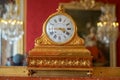 gilded bedside clock of the palace of Versailles France Royalty Free Stock Photo