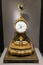 Gilded bronze clock embedded with painted stones