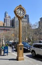 A gilded cast-iron street clock at 200 Fifth Av in NYC Royalty Free Stock Photo