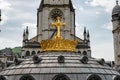 Gilded crown of the Lourdes Basilica. Pilgrimage to Lourdes