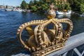 Gilded crown on the Skeppsholmsbron bridge in Stockholm, Sweden