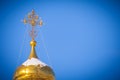 Gilded dome of a Christian temple a background of blue sky Royalty Free Stock Photo