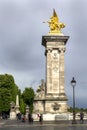 Gilded Fames sculptures Pegasus on the socle counterweights on Pont Alexandre III in Paris, France Royalty Free Stock Photo